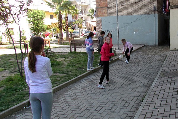 girls playing dodge ball next to our apartment